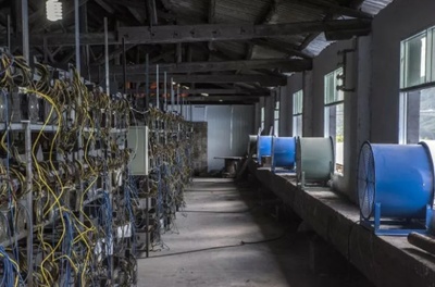 A expansive mining farm filled with ASIC rigs, showcasing the organized environment for efficient cryptocurrency mining
