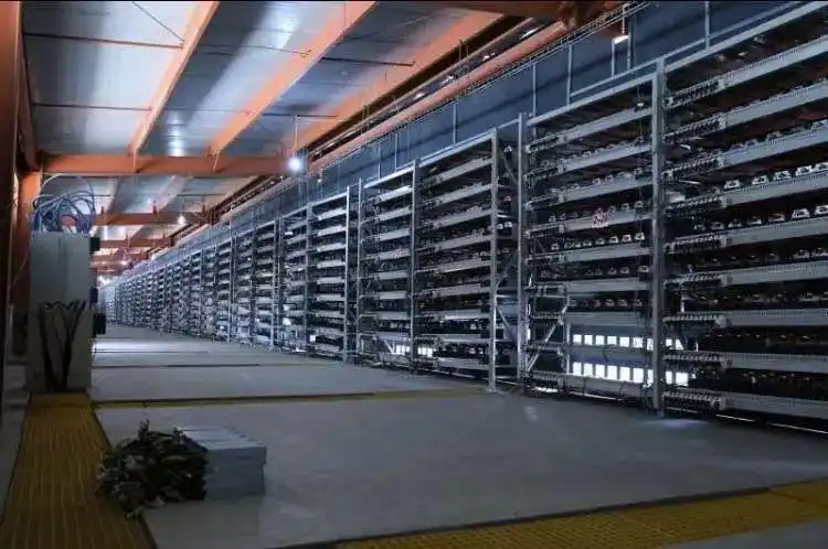 A vast cryptocurrency mining farm with rows of ASICs.